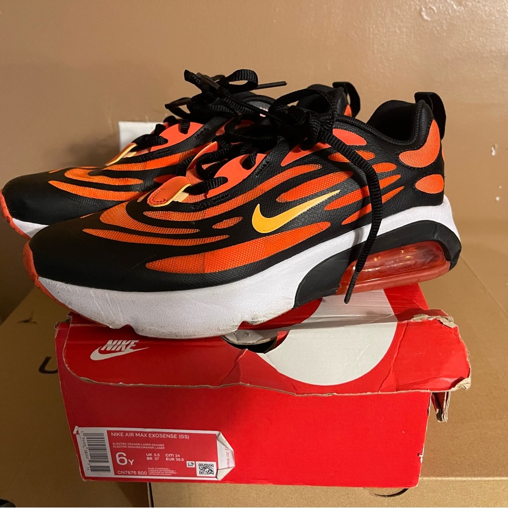 Orange and black Nike sneakers